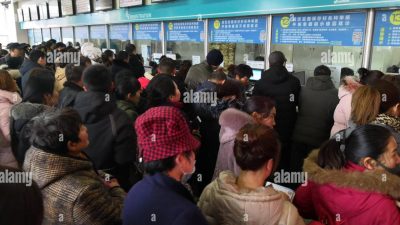 Patients crowd the First Affiliated Hospital of Zhengzhou University in ...